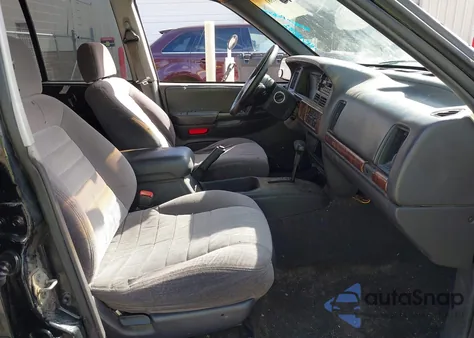 1997 Jeep Grand Cherokee Laredo/Tsi z USA, uszkodzony, nr VIN 1J4FX58SXVC576221